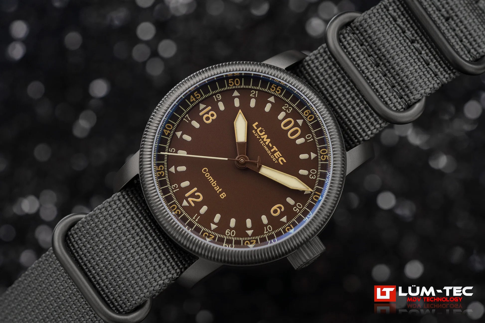 Lum-Tec Combat B60 24HR angled view showing gunmetal PVD case
