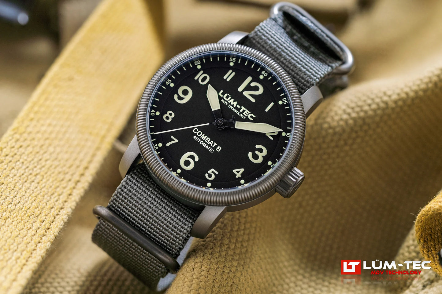 Lum-Tec Combat B69 Automatic angled view showing gunmetal PVD case